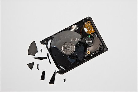 Pile of smashed computer parts Stock Photo - Premium Royalty-Free, Code: 649-06165315