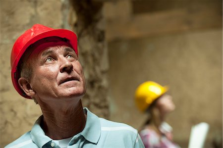 renovations man - Construction worker wearing hard hat Stock Photo - Premium Royalty-Free, Code: 649-06304877