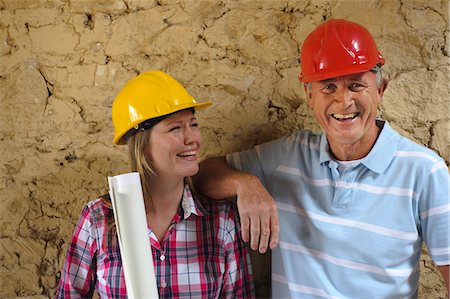 family protected - Construction workers laughing together Foto de stock - Sin royalties Premium, Código: 649-06304873