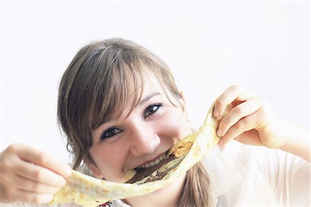 pancake - Teenage girl playing with pancake Stock Photo - Premium Royalty-Free, Code: 649-06305836