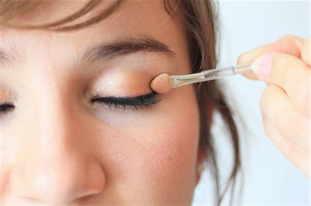 Make up artist applying eyeshadow Stock Photo - Premium Royalty-Free, Code: 649-06305845