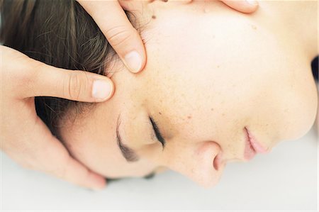 simsearch:649-06164622,k - Close up of woman having scalp massage Stock Photo - Premium Royalty-Free, Code: 649-06305842