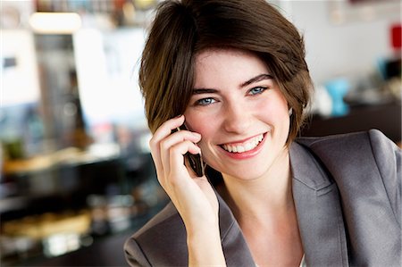 simsearch:649-06041170,k - Businesswoman talking on cell phone Stock Photo - Premium Royalty-Free, Code: 649-06352533