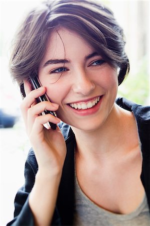 simsearch:649-06041170,k - Woman talking on cell phone Stock Photo - Premium Royalty-Free, Code: 649-06352547