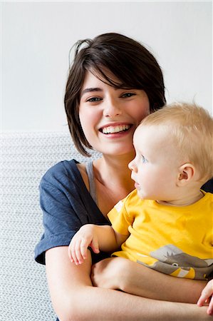 simsearch:649-05800987,k - Mother and baby sitting on bed Stock Photo - Premium Royalty-Free, Code: 649-06352566