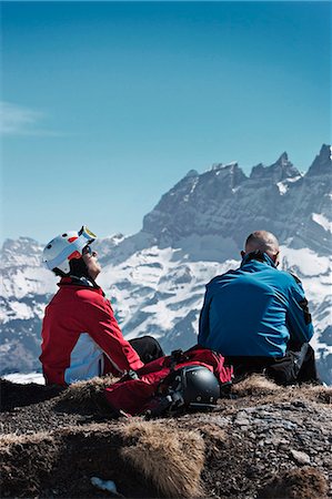 Skiers resting on rocky mountaintop Stock Photo - Premium Royalty-Free, Code: 649-06353024