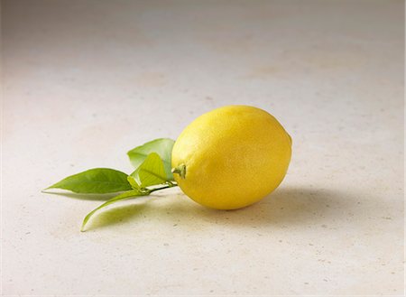 single lemon - Lemon and basil leaves Stock Photo - Premium Royalty-Free, Code: 649-06400600