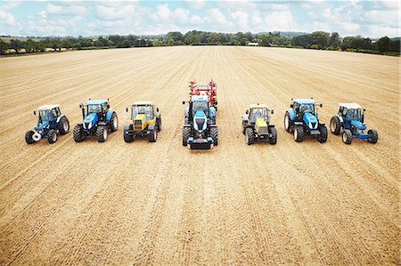 simsearch:649-06401239,k - Tractors parked in tilled crop field Stock Photo - Premium Royalty-Free, Code: 649-06401220