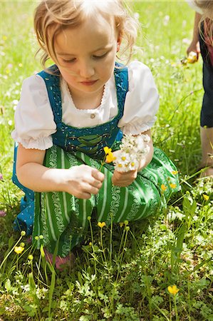 flower with reflection - Girl in traditional Bavarian clothes Stock Photo - Premium Royalty-Free, Code: 649-06432729