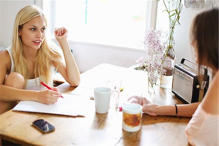 radio - Smiling women having cup of coffee Stock Photo - Premium Royalty-Free, Code: 649-06432917