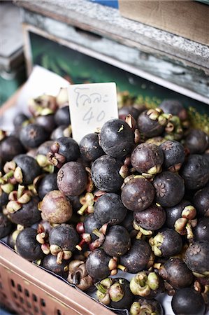 fruits basket for supermarket - Mangosteen for sale at market Stock Photo - Premium Royalty-Free, Code: 649-06433235