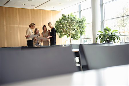 strategy table - Businesswomen talking in cafeteria Stock Photo - Premium Royalty-Free, Code: 649-06488677