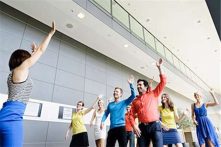 Business people dancing in office Stock Photo - Premium Royalty-Free, Code: 649-06488715