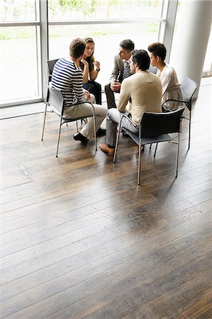 five - Business people talking in office Stock Photo - Premium Royalty-Free, Code: 649-06488797