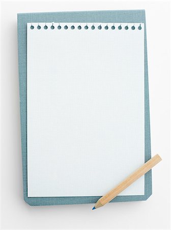 pad of paper - Notepad paper with pencil Photographie de stock - Premium Libres de Droits, Code: 649-06488855