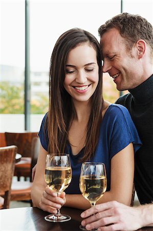 simsearch:649-05556305,k - Couple drinking wine at cafe Stock Photo - Premium Royalty-Free, Code: 649-06488889