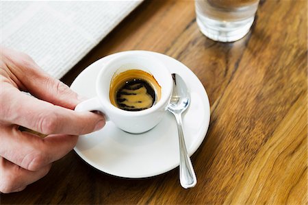 Close up of hands holding cappuccino Stock Photo - Premium Royalty-Free, Code: 649-06488881