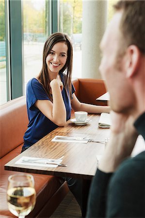 flirting - People admiring each other in cafe Stock Photo - Premium Royalty-Free, Code: 649-06488893
