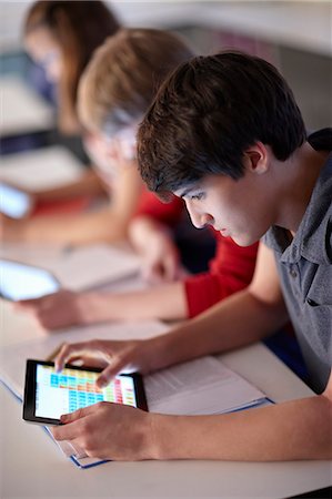 school - Student using tablet computer in class Stock Photo - Premium Royalty-Free, Code: 649-06489984