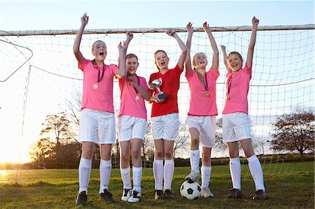 soccer field - Football team cheering in field Foto de stock - Sin royalties Premium, Código: 649-06490148