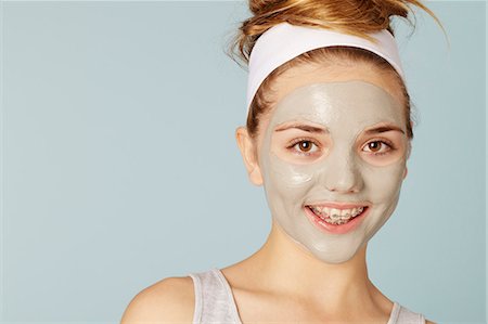 Smiling girl wearing face mask Stock Photo - Premium Royalty-Free, Code: 649-06533080
