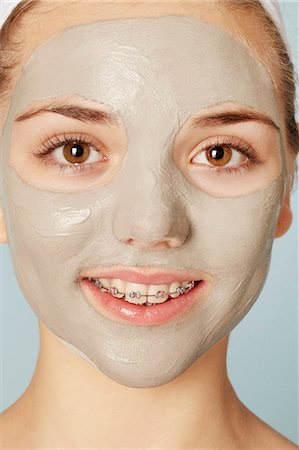 Smiling girl wearing face mask Stock Photo - Premium Royalty-Free, Code: 649-06533082