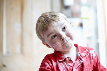 flour - Boys face covered in flour in kitchen Stock Photo - Premium Royalty-Free, Code: 649-06533353