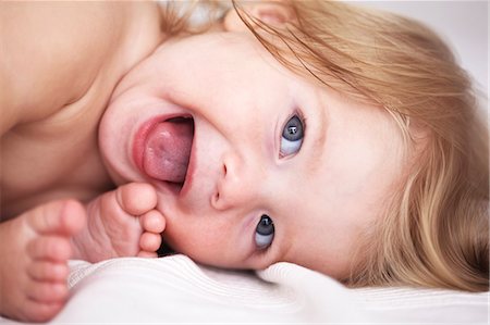 Close up of baby girls smiling face Stock Photo - Premium Royalty-Free, Code: 649-06533369