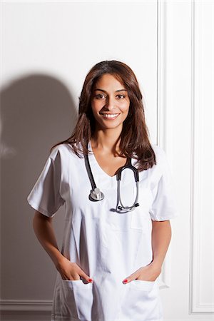 paris one woman - Doctor wearing stethoscope in office Photographie de stock - Premium Libres de Droits, Code: 649-06622008