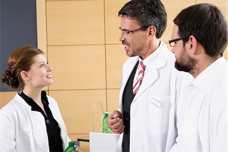 simsearch:649-06716741,k - Doctors talking in conference room Stock Photo - Premium Royalty-Free, Code: 649-06622083