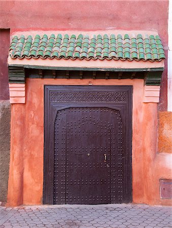 doors - Ornate metal door on village street Stock Photo - Premium Royalty-Free, Code: 649-06622272