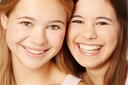 pretty human face frontal view - Close up of teenage girls smiling faces Stock Photo - Premium Royalty-Free, Code: 649-06622426