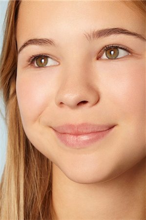 simsearch:649-06717849,k - Close up of teenage girls smiling face Stock Photo - Premium Royalty-Free, Code: 649-06622437