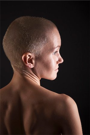 shaved head - Profile of woman with shaved head Stock Photo - Premium Royalty-Free, Code: 649-06622676
