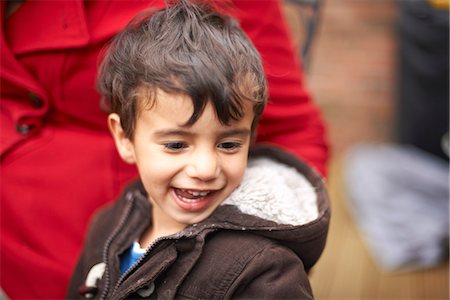 east indian mother and children - Close up of boys smiling face Stock Photo - Premium Royalty-Free, Code: 649-06623029