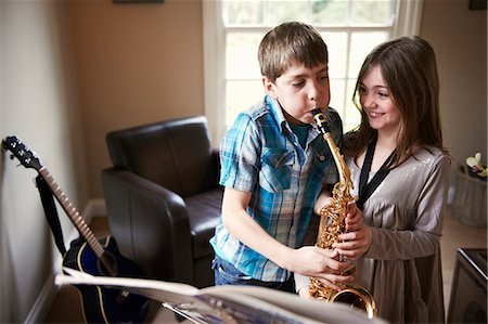 simsearch:649-06716505,k - Children playing with saxophone Stock Photo - Premium Royalty-Free, Code: 649-06716495