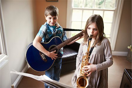 simsearch:649-06716505,k - Children playing music together Stock Photo - Premium Royalty-Free, Code: 649-06716497