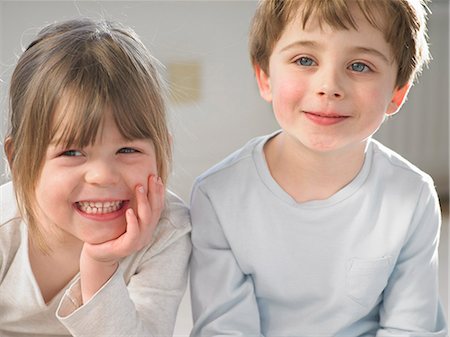 simsearch:649-06041783,k - Children smiling together indoors Stock Photo - Premium Royalty-Free, Code: 649-06716539