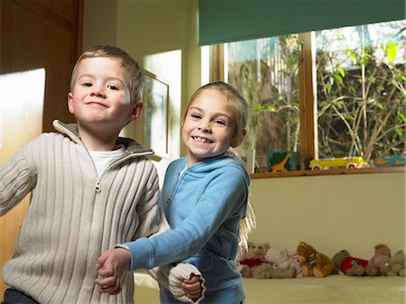 simsearch:649-06716505,k - Children playing together indoors Stock Photo - Premium Royalty-Free, Code: 649-06716550