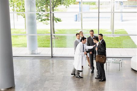 doctor white coat full body - Business people and doctors greeting Stock Photo - Premium Royalty-Free, Code: 649-06716705