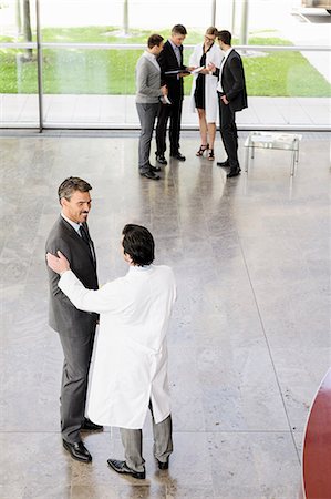 doctor white coat full body - Business people and doctors greeting Stock Photo - Premium Royalty-Free, Code: 649-06716708