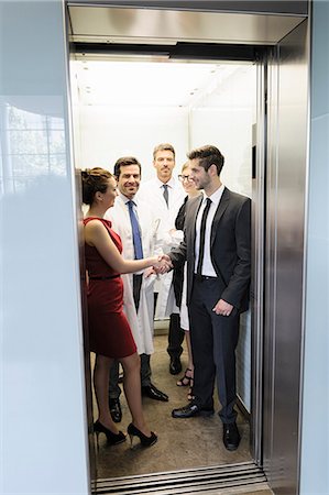 doctors together - Doctors and business people in elevator Stock Photo - Premium Royalty-Free, Code: 649-06716736
