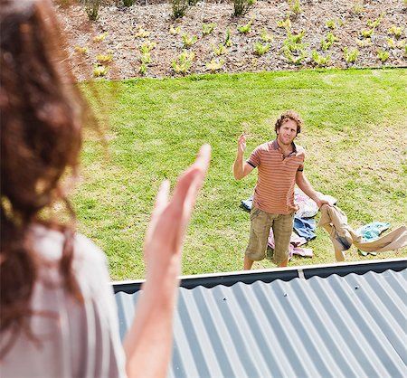 Woman arguing with boyfriend in backyard Stock Photo - Premium Royalty-Free, Code: 649-06717028