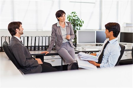 simsearch:649-06000952,k - Business people talking in office Stock Photo - Premium Royalty-Free, Code: 649-06717048