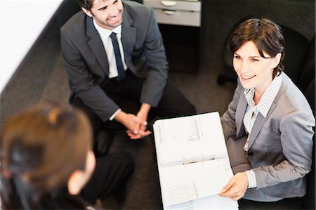 simsearch:649-06000952,k - Business people talking in office Stock Photo - Premium Royalty-Free, Code: 649-06717060