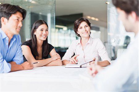 female and thirties and business - Business people talking in meeting Foto de stock - Sin royalties Premium, Código: 649-06717099