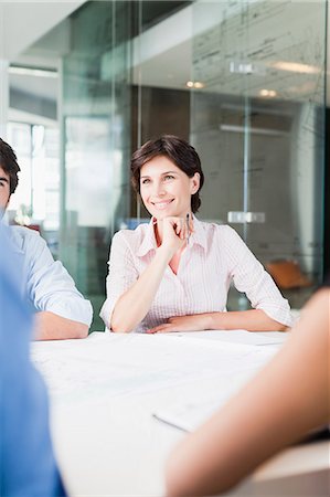 simsearch:649-06000952,k - Businesswoman sitting in meeting Stock Photo - Premium Royalty-Free, Code: 649-06717106