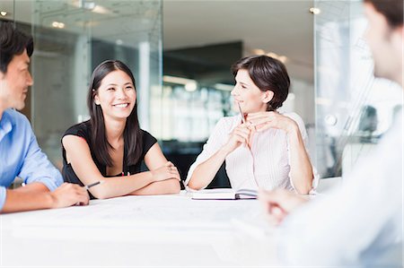 simsearch:649-06000952,k - Business people talking in meeting Stock Photo - Premium Royalty-Free, Code: 649-06717100