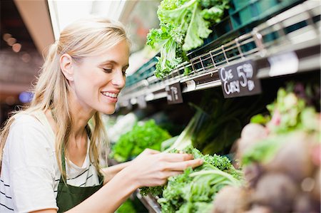 retail worker - Grocer working in produce section Stock Photo - Premium Royalty-Free, Code: 649-06717196