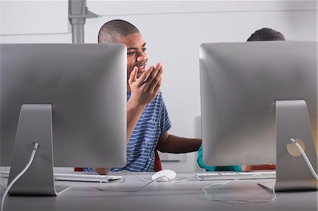 signs on school - Children using computers at desk Stock Photo - Premium Royalty-Free, Code: 649-06717383